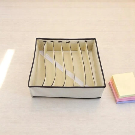 Organizador de gavetas com 7 divisões, portátil, para dobrar roupas e guardar objetos.