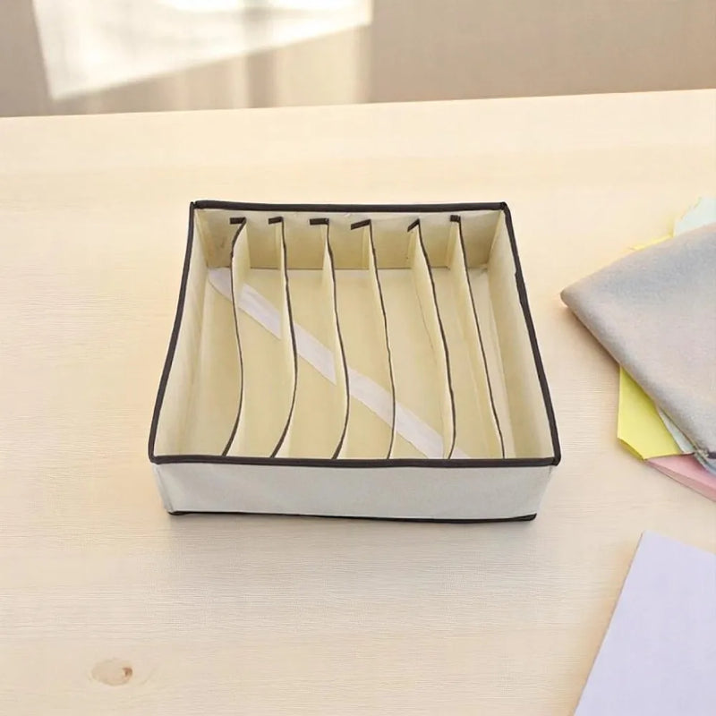 Organizador de gavetas com 7 divisões, portátil, para dobrar roupas e guardar objetos.